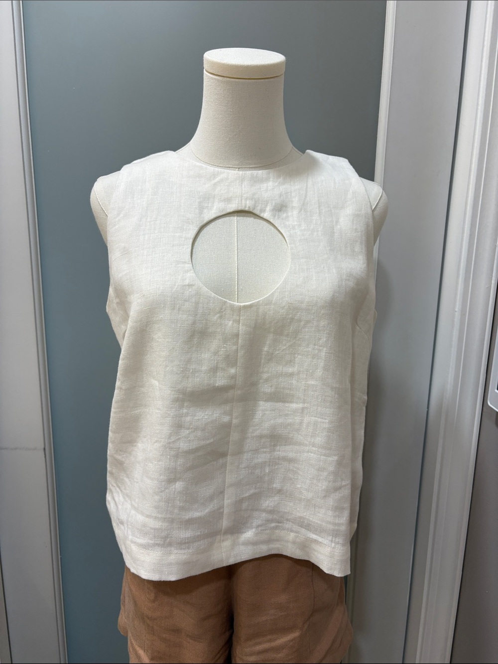 Sleeveless Cream Linen Top with Front Cutout